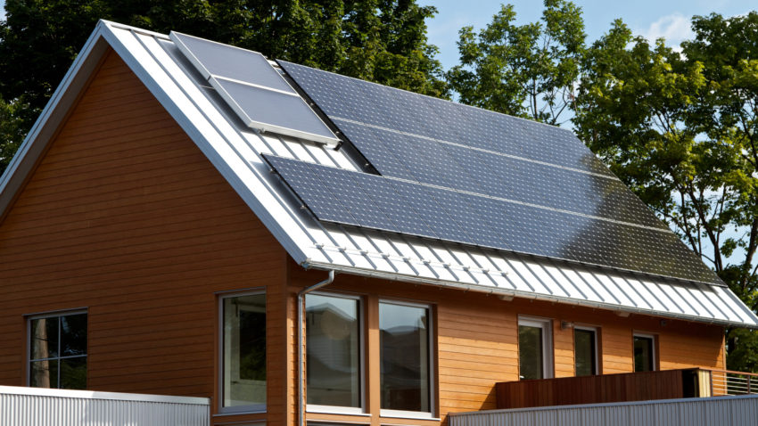 Green house with solar panels, Portland, Maine